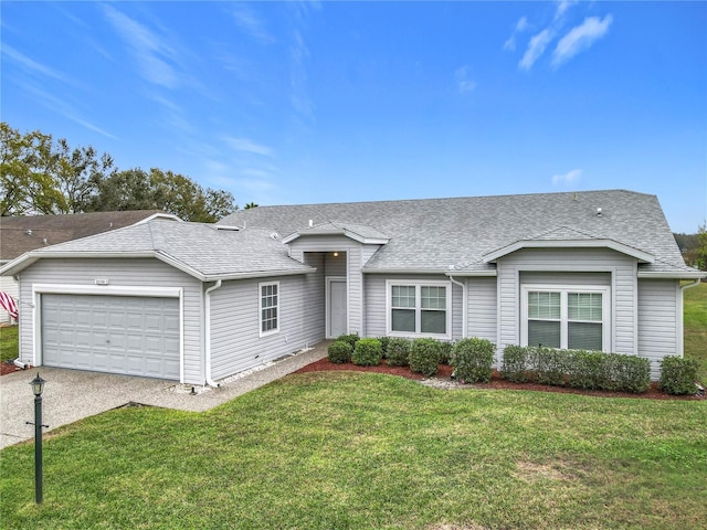 ranch-style house with a garage, driveway, a front lawn, and a shingled roof