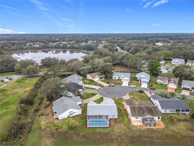 bird's eye view with a water view and a residential view