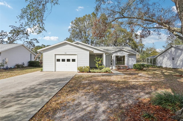 view of front of home featuring driveway and an attached garage