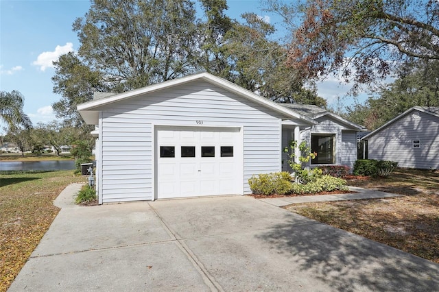 single story home featuring driveway and an attached garage