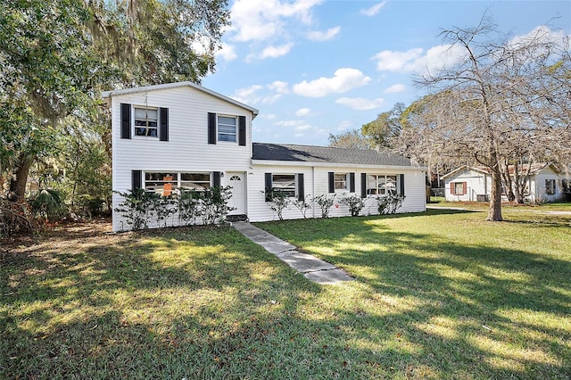 view of front of home with a front lawn