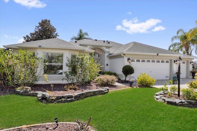 single story home featuring a garage, concrete driveway, roof with shingles, stucco siding, and a front lawn