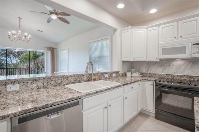 kitchen featuring light tile patterned floors, dishwasher, white microwave, black range with electric cooktop, and a sink