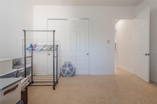 bedroom featuring carpet, visible vents, and baseboards