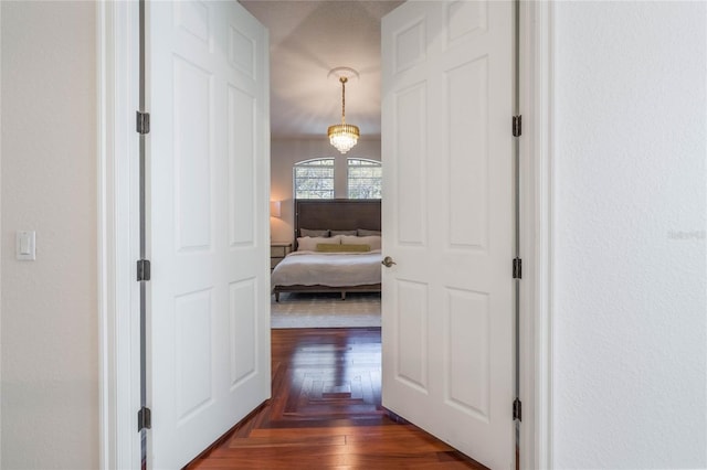 hall featuring dark wood-type flooring