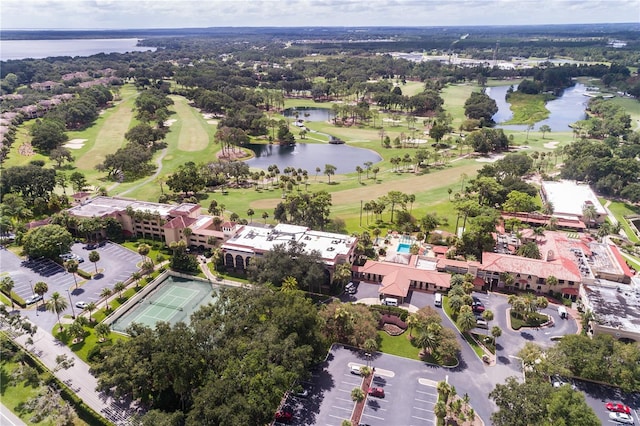 aerial view with a water view and golf course view