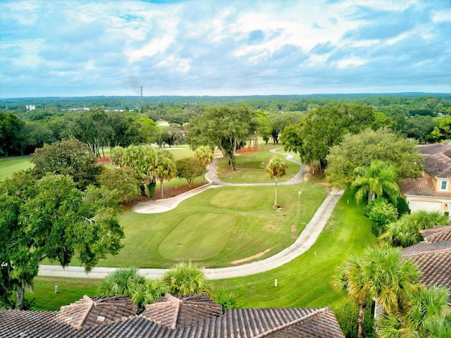 bird's eye view with view of golf course