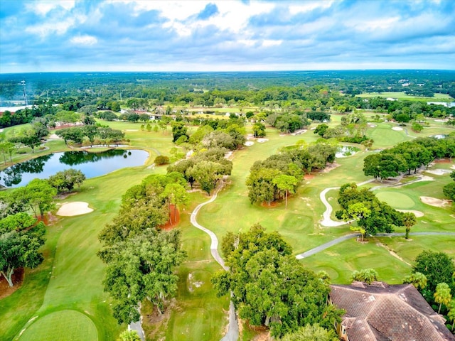 birds eye view of property featuring a water view and golf course view