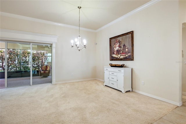 empty room with light colored carpet, baseboards, crown molding, and an inviting chandelier