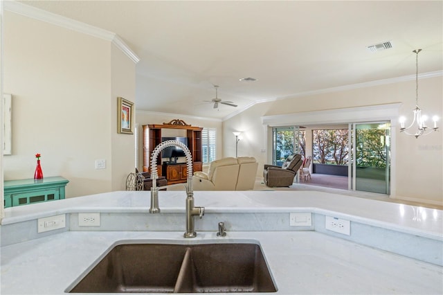 3144 Mayflower Loop, The Villages, FL 32163 - kitchen featuring visible vents, crown molding, open floor plan, lofted ceiling, and a sink