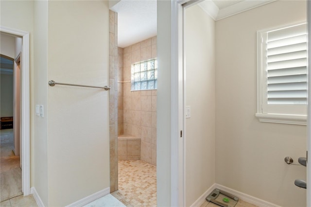 3144 Mayflower Loop, The Villages, FL 32163 - bathroom with baseboards and tiled shower