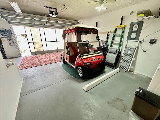 garage with a ceiling fan and a garage door opener