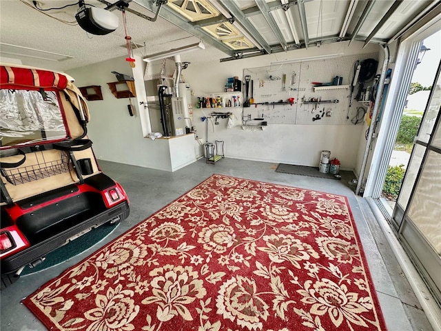 garage featuring water heater and a garage door opener