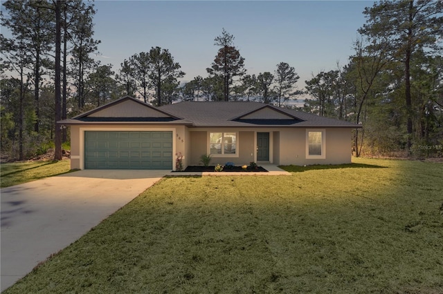 ranch-style home featuring a front yard, concrete driveway, an attached garage, and stucco siding