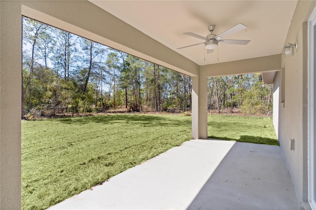 view of patio / terrace featuring ceiling fan