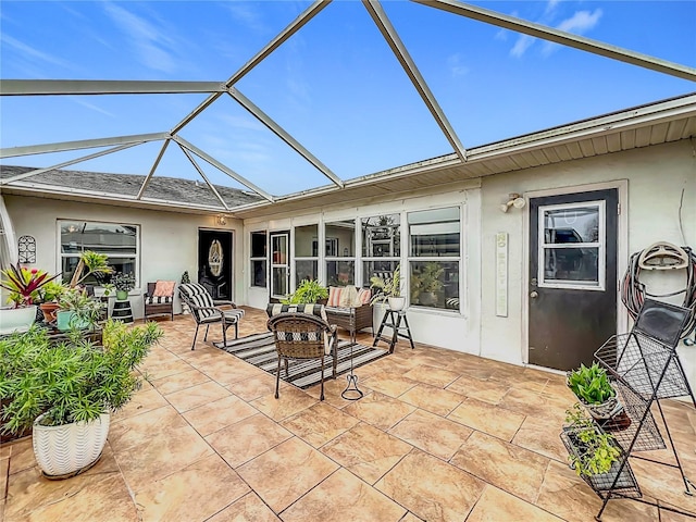 view of patio / terrace with glass enclosure and an outdoor hangout area