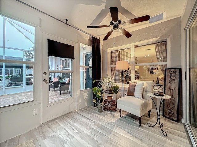 sunroom / solarium with visible vents