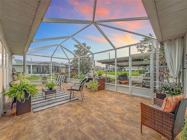 patio terrace at dusk with a lanai