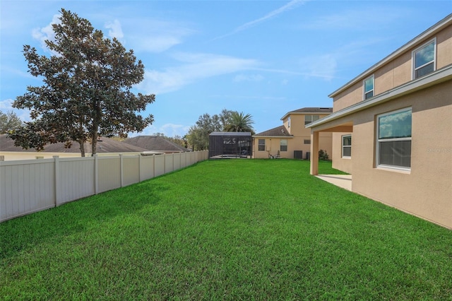 view of yard with fence