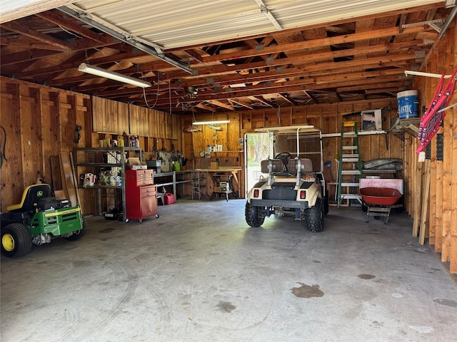 garage featuring a workshop area