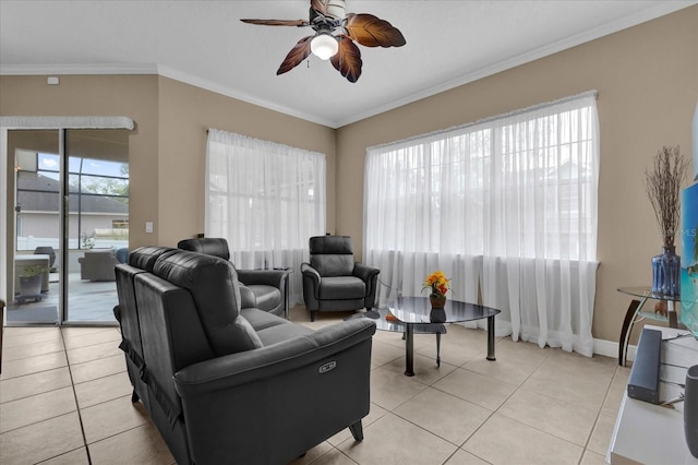 living area featuring light tile patterned floors, plenty of natural light, and crown molding