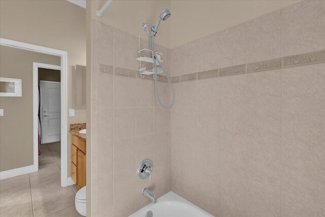 full bathroom featuring baseboards, vanity, shower / bathing tub combination, and tile patterned floors