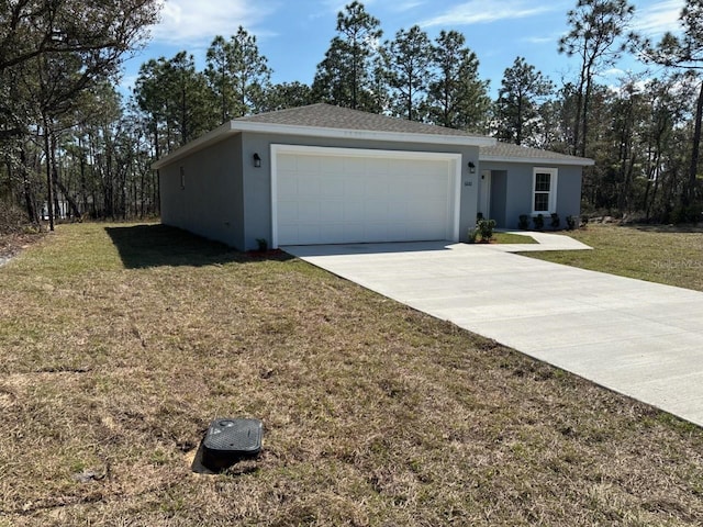 ranch-style house with stucco siding, a shingled roof, concrete driveway, a front yard, and a garage