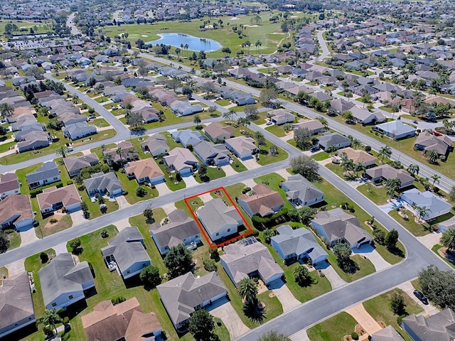 aerial view with a residential view and a water view