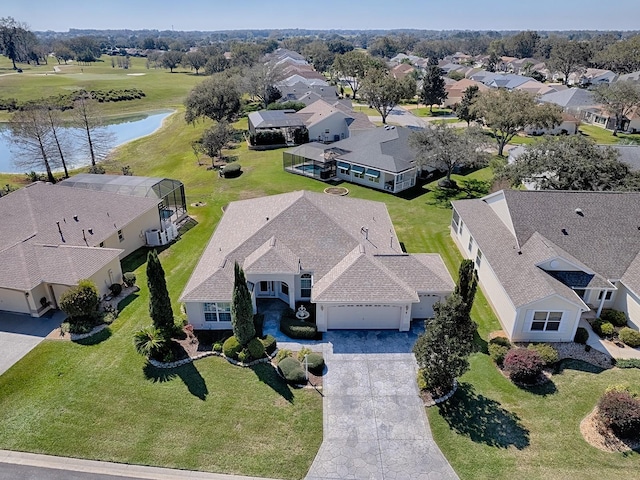 aerial view with a water view and a residential view