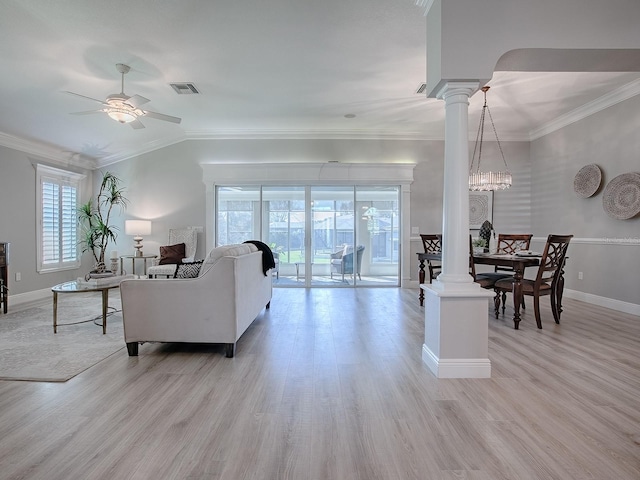 living room featuring ornamental molding, light wood-type flooring, ornate columns, and a ceiling fan