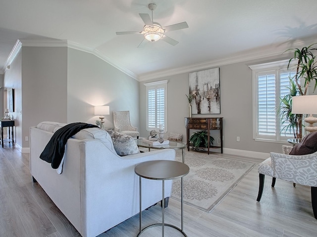 living room with ornamental molding, a wealth of natural light, and lofted ceiling