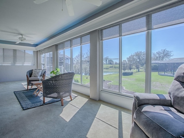 sunroom / solarium with ceiling fan