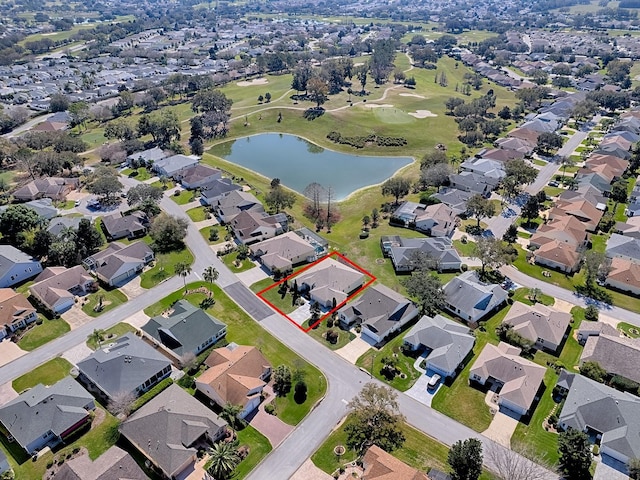 birds eye view of property with a residential view and a water view