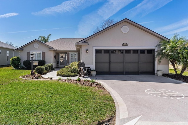 ranch-style home with a garage, a front yard, concrete driveway, and stucco siding