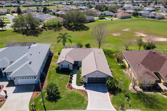 birds eye view of property with a residential view