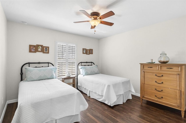 bedroom with dark wood finished floors, baseboards, and ceiling fan