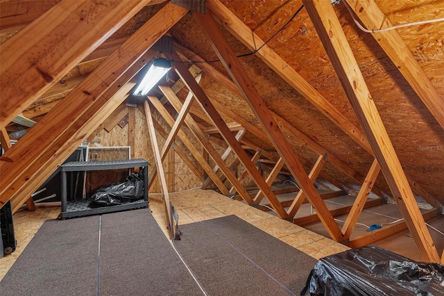 view of unfinished attic