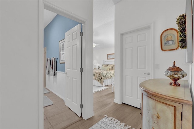 1923 Greeleyville Ter, The Villages, FL 32162 - hallway with light wood-style floors
