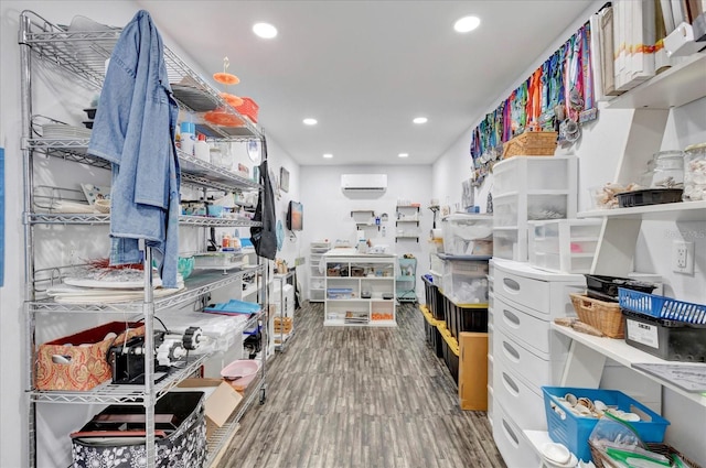 storage room featuring a wall unit AC