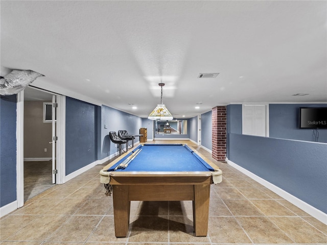 recreation room with visible vents, baseboards, and light tile patterned flooring