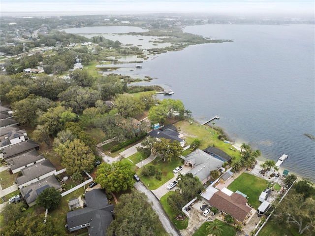 bird's eye view with a water view and a residential view