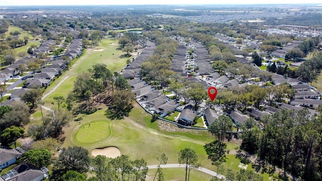 aerial view featuring a residential view and golf course view