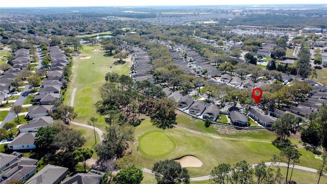 bird's eye view featuring golf course view and a residential view