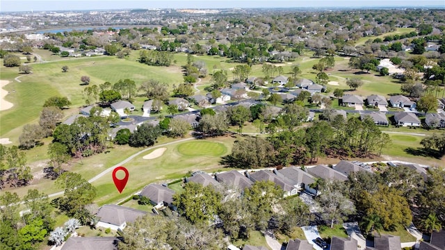 bird's eye view featuring golf course view and a residential view