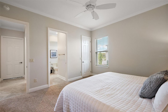 bedroom with light carpet, baseboards, ensuite bath, ceiling fan, and crown molding