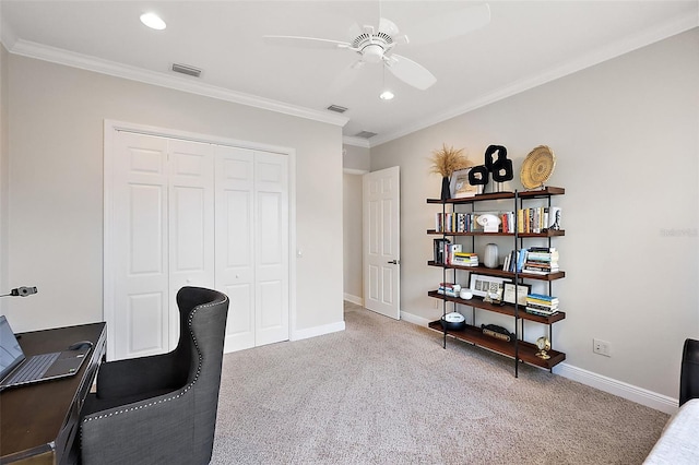 office space with carpet floors, baseboards, visible vents, and ornamental molding