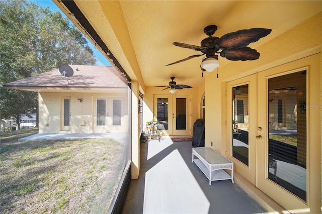 view of patio with ceiling fan and french doors