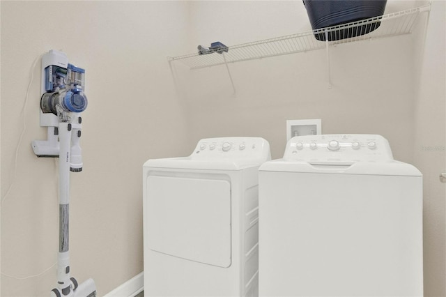 laundry room featuring laundry area and washer and clothes dryer