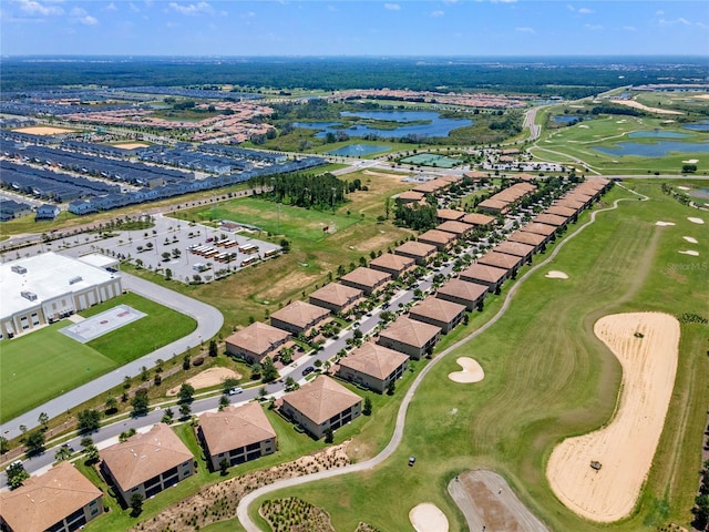 birds eye view of property with a residential view, a water view, and golf course view