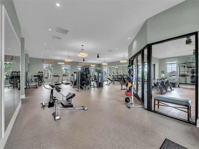 exercise room with recessed lighting and visible vents